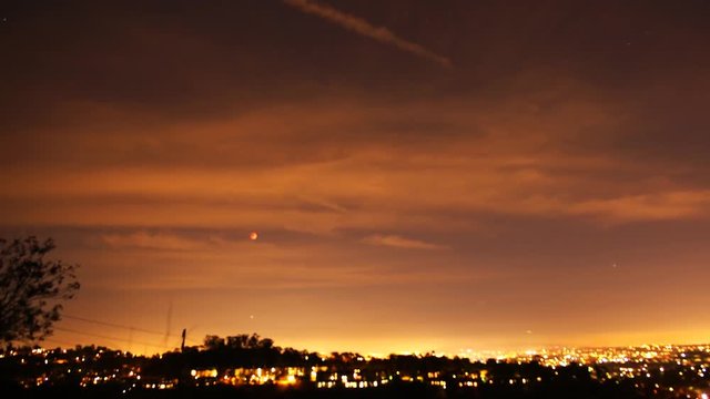 Time Lapse of Lunar Eclipse Rising over Cityscape in LA 2015 Sep -Pan Right-
