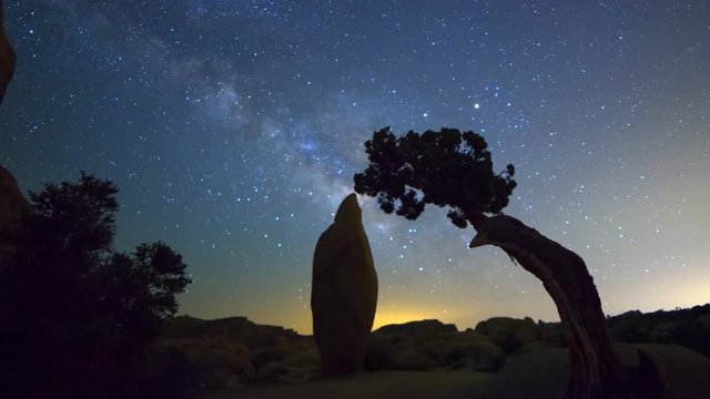 MoCo Dolly Astro TimeLapse of Galaxy thru Rock & Cypress in Joshua Tree -Pan R-