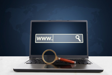 Laptop with magnifier and browser page