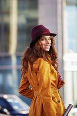 Obraz premium Autumn portrait of happy girl on a walk