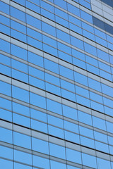 Background blue office glass windows in vertical frame