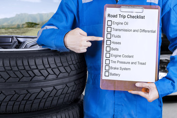 Mechanic giving road trip tips