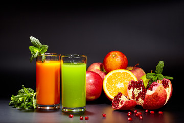 Glasses with fresh organic vegetable and fruit juices isolated 