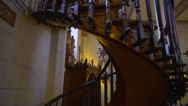 Tracking Shot of Loretto Chapel Staircase in Santa Fe, New Mexico -Tilt Up 2-