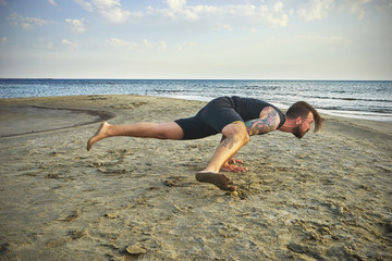 Man practicing yoga in various poses (asana)