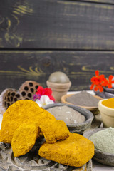 Ancient minerals - black, green, blue, ochre clay powder and mud mask