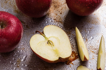 sliced apple on steel plate