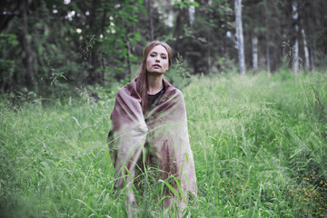 Portrait of beautiful girl on nature with the handkerchief
