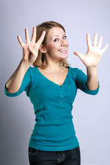 Portrait of beautiful girl in Studio emotions and gestures