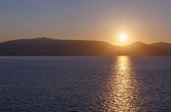 Fototapeta view on sunrise in Greece