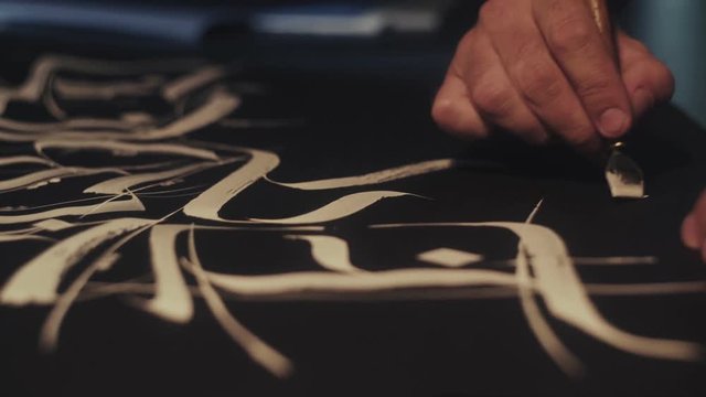 Calligraphy. Calligraphic font. Calligrapher s work. Pen in hand calligraphy. Hands calligrapher. Calligraphy ornament. Calligrapher s work. Tools for calligraphy. Calligrapher s workplace