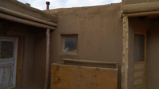 Pan Shot of Traditional Indian House in Taos Pueblo, New Mexico -Pan Right-