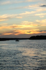 Sun is going under at the Sambesi River, Zambia Africa