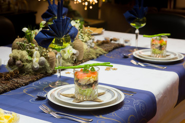 Christmas dinner table in blue