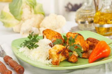 Cauliflower in breadcrumbs with grated parmesan cheese, healthy vegetarian meal