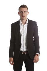 Portrait of handsome young man in a suit jacket in Studio on white isolated background