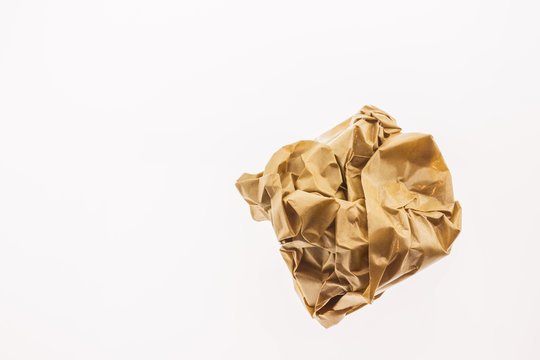 Crumpled brown paper isolated on white