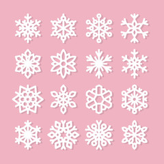 Cute snowflake collection isolated on pink background. Flat snow icons, snow flakes silhouette. Nice element for christmas banner, cards. New year ornament. Organic and geometric snowflakes set.