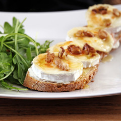 goat cheese with honey on a slice of bread