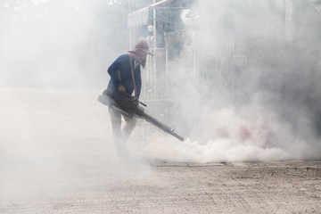 Man carries out fogging at village for anti-mosquito plan. anti zika virus