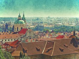 Roof tops of the old city of Prague, Czech Republic. Vintage, distressed textured effect
