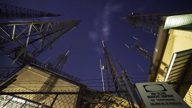 Time Lapse of broadcast radio tower at night shot through storm clouds at Mt. Wilson, California
