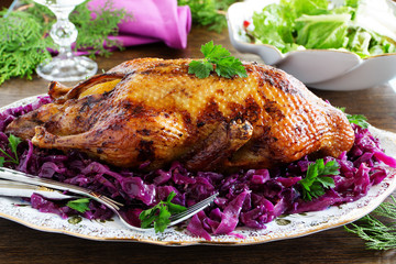 Roast duck with apples and red cabbage.