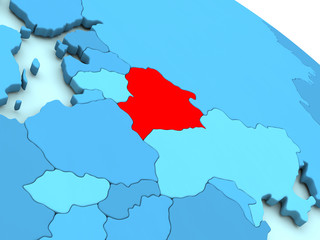 Belarus in red on blue globe