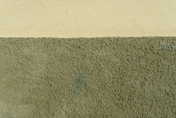 Fototapeta premium texture of a wall with two colors, target and gray, in Salorino, Caceres, in Extremadura, Spain