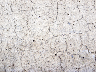 Cracked concrete texture closeup background