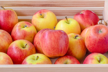 Apple in a wooden crate