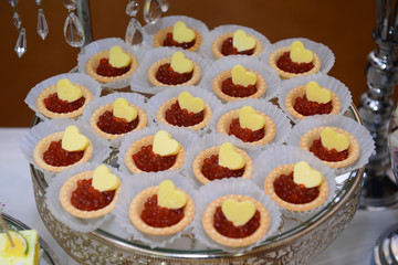 Tartlets with caviar and butter