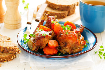 Baked rabbit with vegetables.