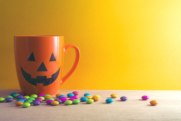 halloween coffee cup and candy
