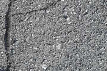 Asphalt texture with cracks. Background.