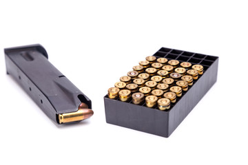 9mm.magazine with bullet box isolate on white background