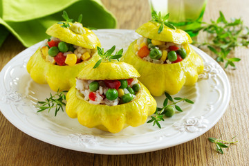 Small scallops stuffed with rice and vegetables. Selective focus.