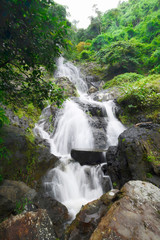 Fototapeta na wymiar The beutiful waterfall (kokedok waterfall) during raining season in Khao Yai National Park, Thailand