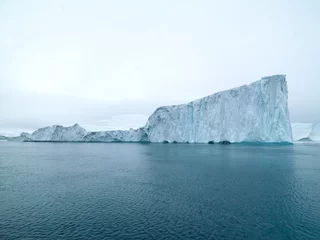 Fotobehang Icebergs on arctic ocean in Ilulissat icefjord, Greenland © murattellioglu
