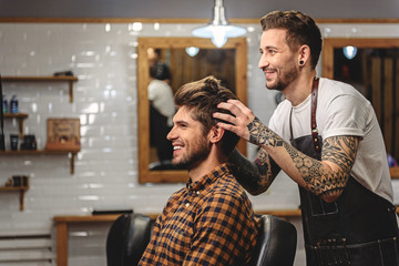 selective focus on barber with client