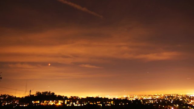 Time Lapse of Lunar Eclipse Rising over Cityscape in LA 2015 Sep -Pan Left-