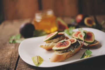 bruschetta with figs, blue cheese and honey. Homemade healthy food