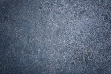 Old metal surface covered with whitewash
