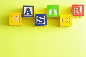 Easter spelled with colorful alphabet blocks 