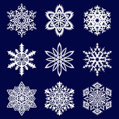 white snowflakes on dark blue background