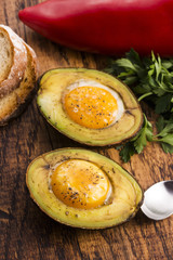 Homemade Organic Egg Baked in Avocado with Salt and Pepper
