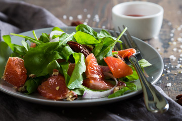 Fresh salad with salmon and grapefruit