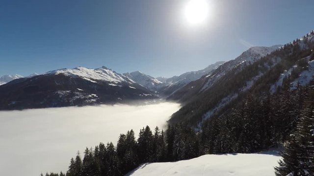 Aerial shot of ski resort of Thyon, the Grand Dixence dam, and the mt Blanc de Cheilon in the southern swiss alps above Sion.