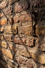 Ancient brick wall and the hook inside the new Church in Delft,