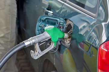 Fuel nozzle add a fuel to a car